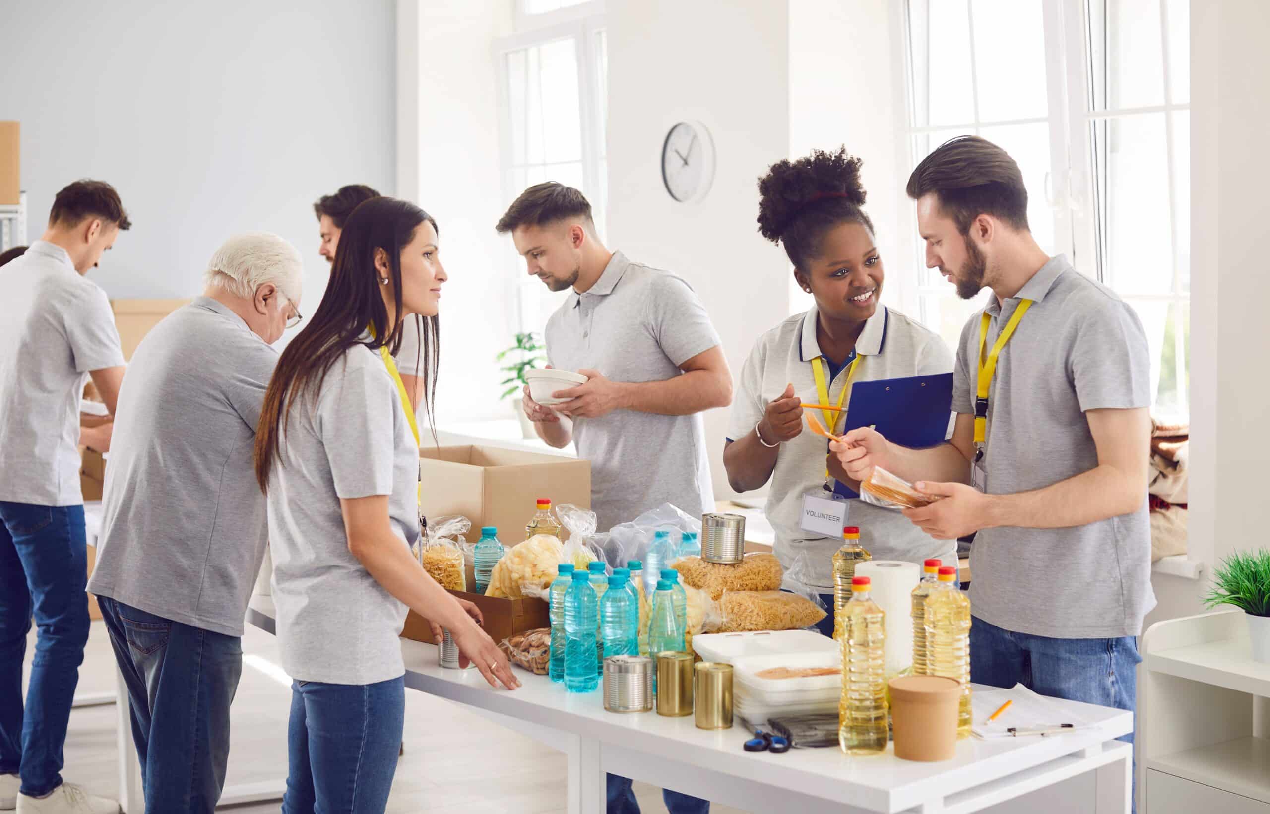 Nonprofit website design blog image image of volunteers packing boxes